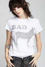 No words needed; our Bad A$$ graphic tee shirt is the best way to describe yourself. This vintage fitted shirt is made from exceptionally soft cotton fabric, with vintage distressed graphics, cuffed short sleeves, distressed hems, and a crewneck collar. 