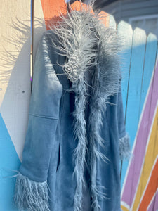 Steal the show with this eyecatching Almost Famous Vegan Fur Coat!  Light blue faux suede material with a faux fur trim detail and a longline design Penny Lane coat 