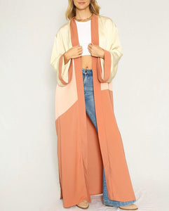 Featuring a statement design on the back, this maxi kimono inspired duster featuring in a silky fabric in relaxed silhouette.